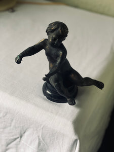 Circa 19th century bronze putti on ebonised base