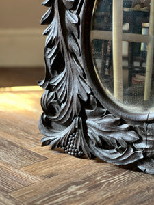 Oak gothic carved mirror. Early 20th century
