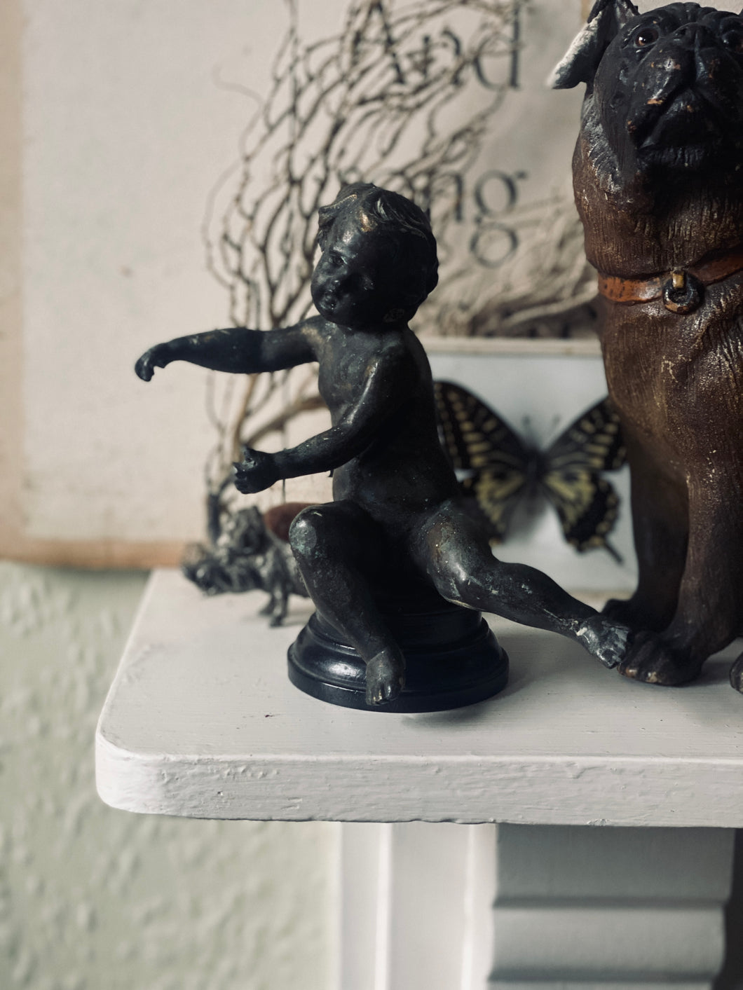 Circa 19th century bronze putti on ebonised base