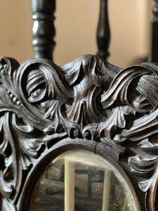 Oak gothic carved mirror. Early 20th century